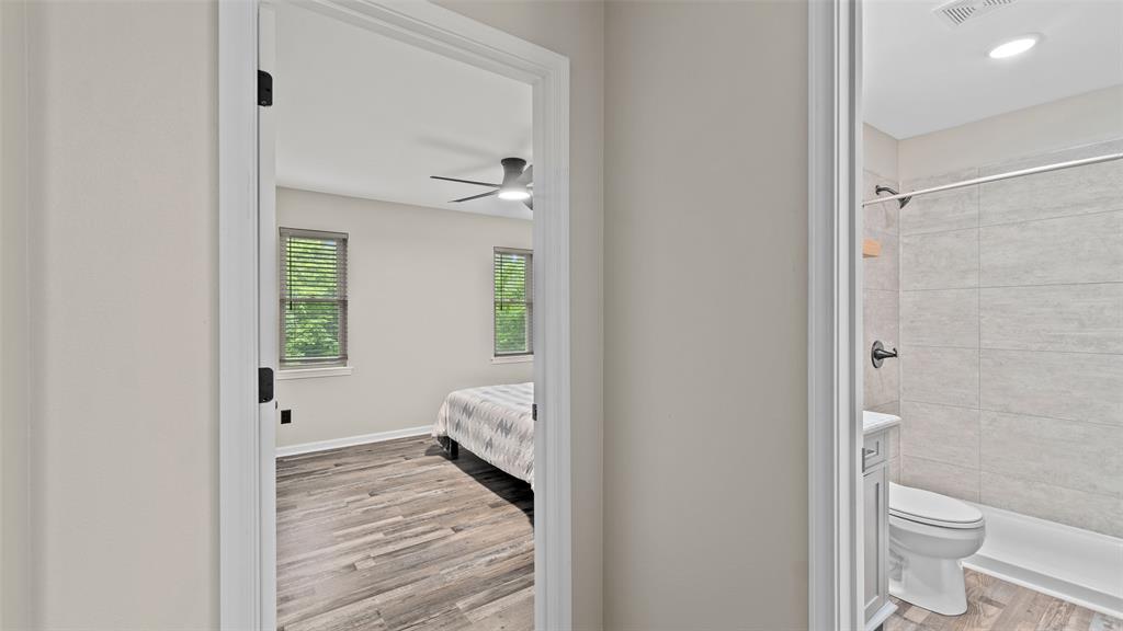 228 Old Factory Road Murfreesboro, AR 71958 - Photo 18 of 37 a room that has a bed and a window