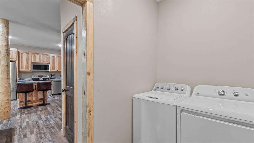 228 Old Factory Road Murfreesboro, AR 71958 - Photo 24 of 37 a utility room with dryer and washer