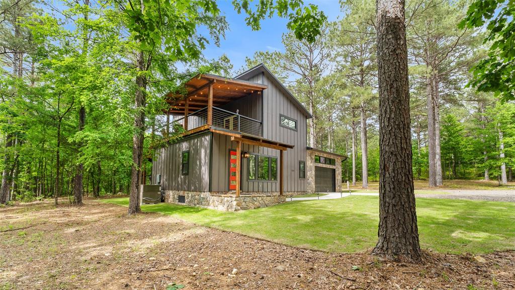 228 Old Factory Road Murfreesboro, AR 71958 - Photo 30 of 37 front view of a house with a yard