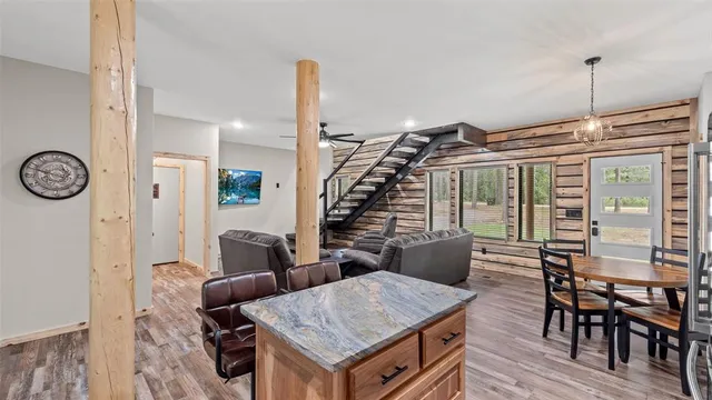 a view of a livingroom with furniture and window