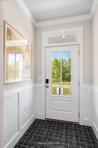 a kitchen with stainless steel appliances granite countertop a sink stove and refrigerator with wooden floor