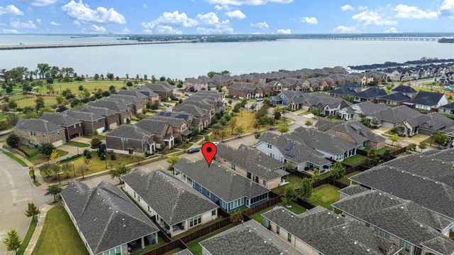 a view of a lake with a yard and lake view