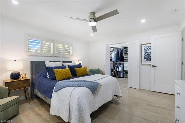 a bed room with a bed and a couch