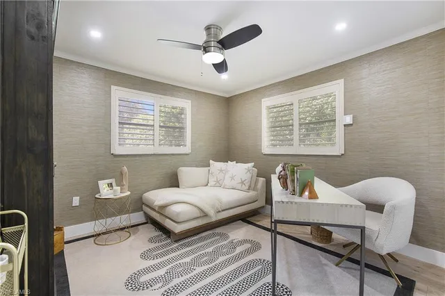 a living room with furniture and a window