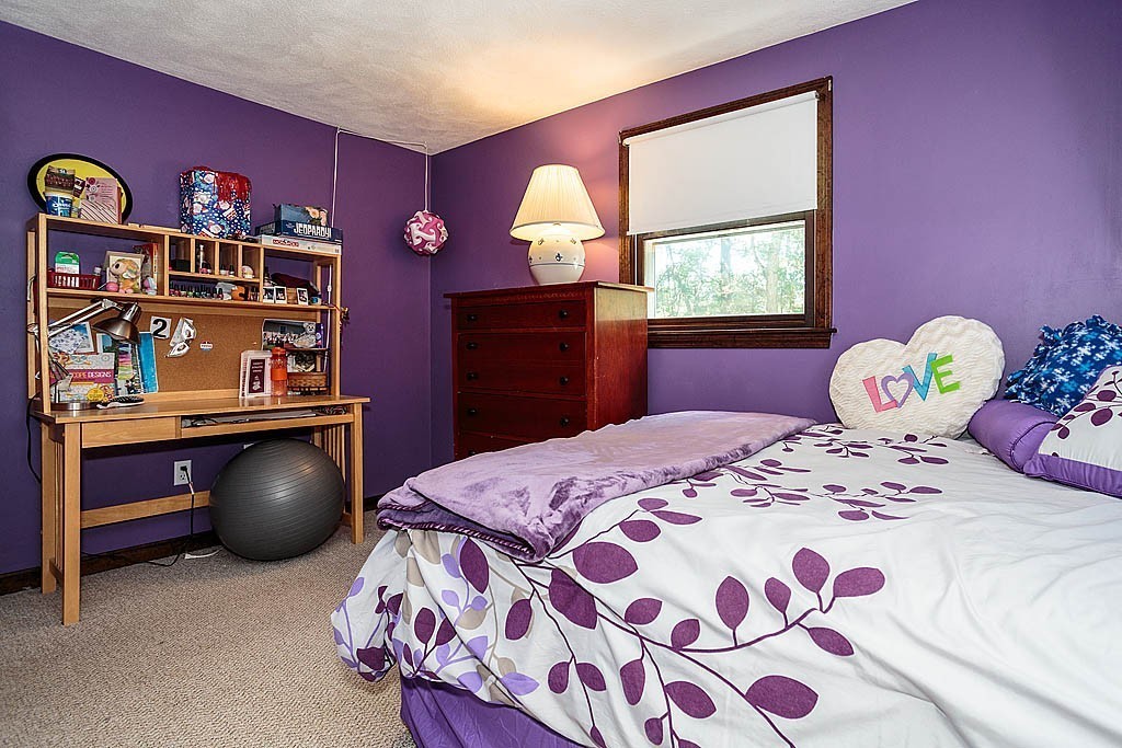 4 Chippewa Road Westford, MA 01886 - Photo 17 of 25 a bedroom with a bed and a window