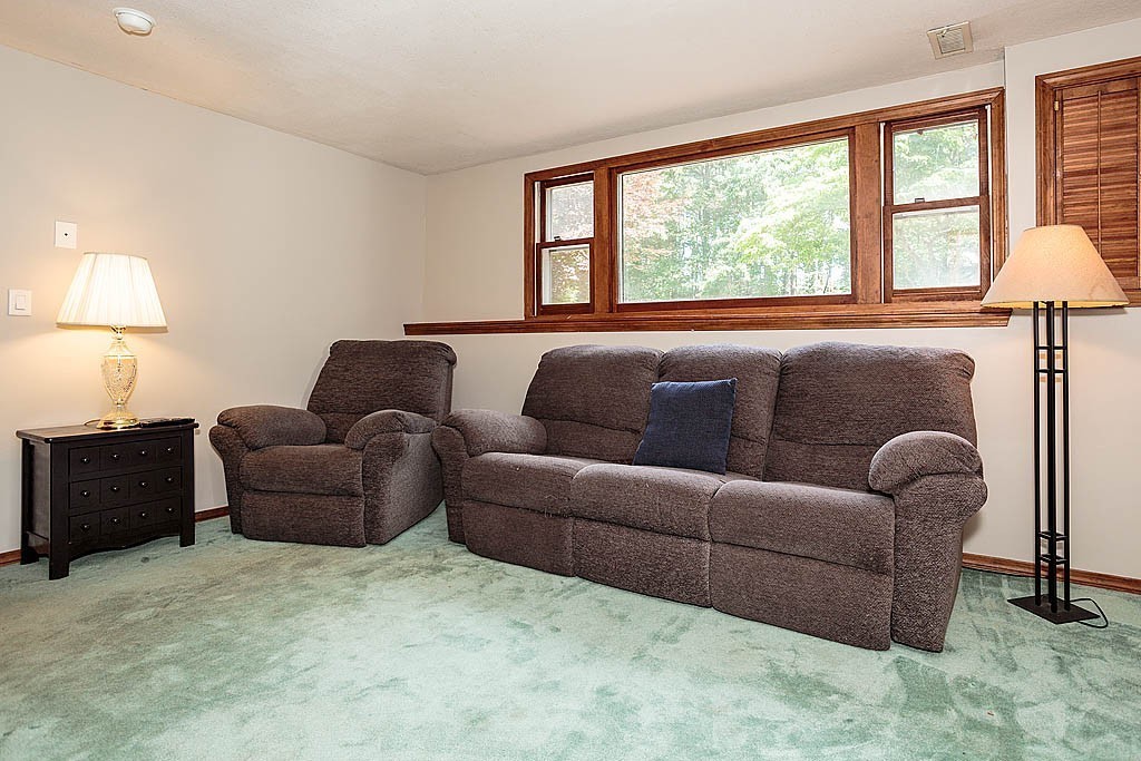 4 Chippewa Road Westford, MA 01886 - Photo 19 of 25 a living room with furniture and a window