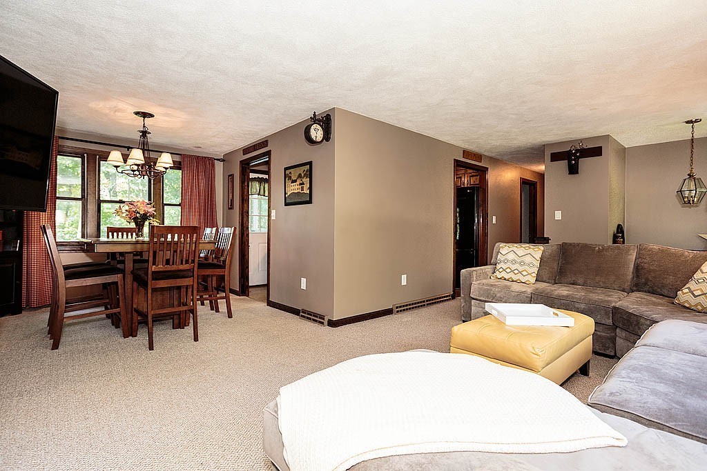 4 Chippewa Road Westford, MA 01886 - Photo 21 of 25 a living room with furniture and a large window