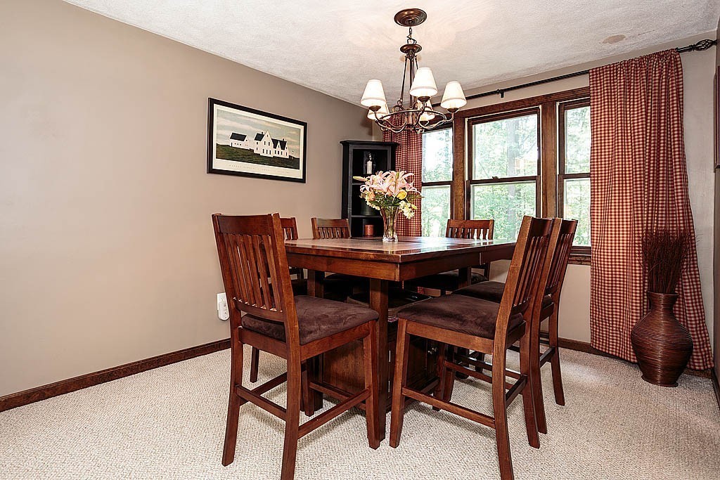 4 Chippewa Road Westford, MA 01886 - Photo 3 of 25 a view of a dining room with furniture window and outside view