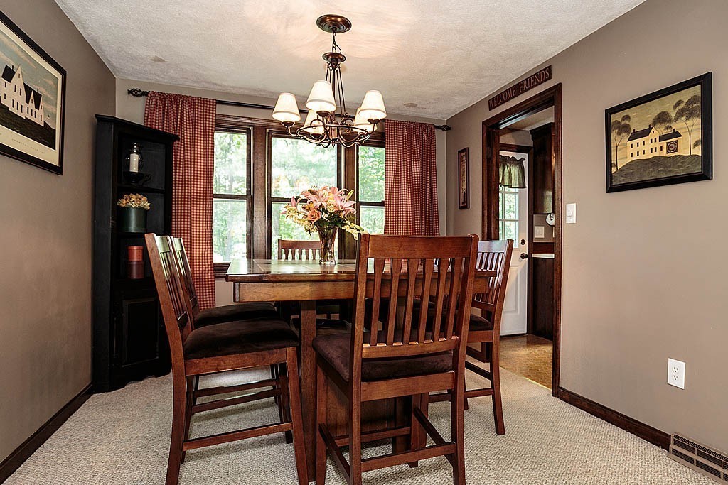 4 Chippewa Road Westford, MA 01886 - Photo 8 of 25 a view of a dining room with furniture window and wooden floor
