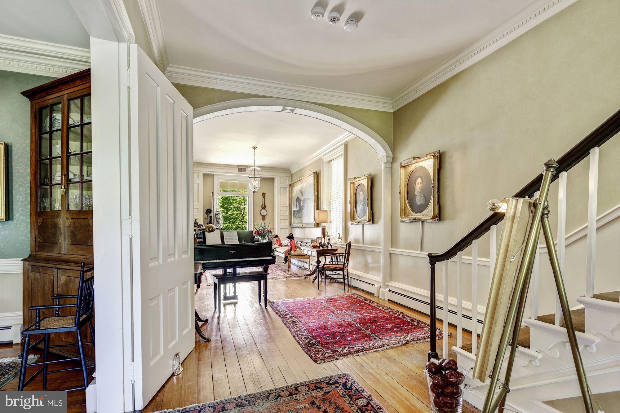 13032 Highland Road Highland, MD 20777 - Photo 14 of 114 a living room with furniture and wooden floor