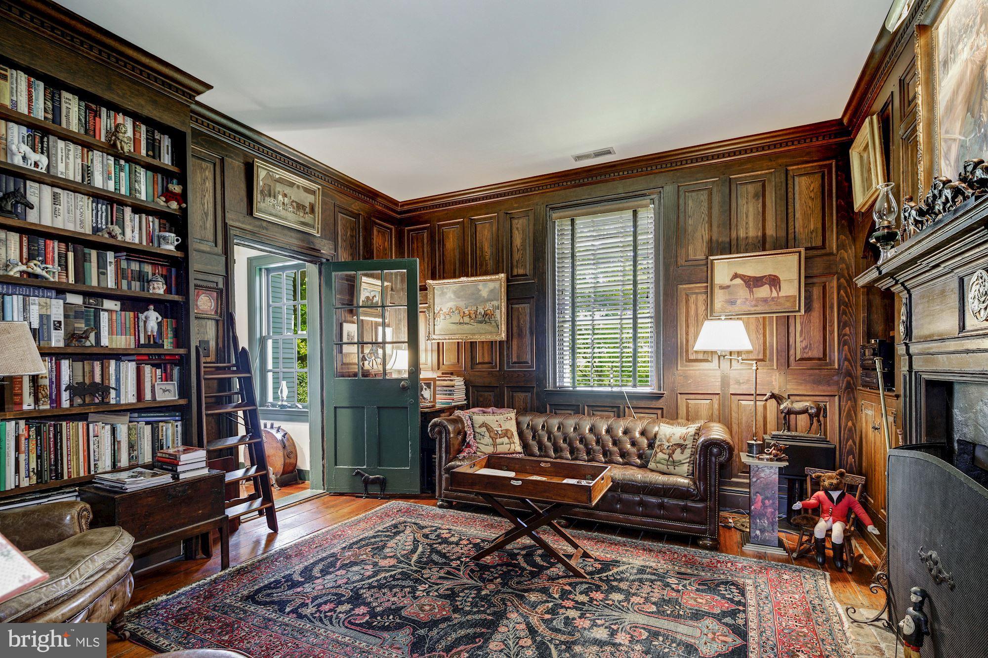 13032 Highland Road Highland, MD 20777 - Photo 26 of 114 a bedroom with furniture and a book shelf