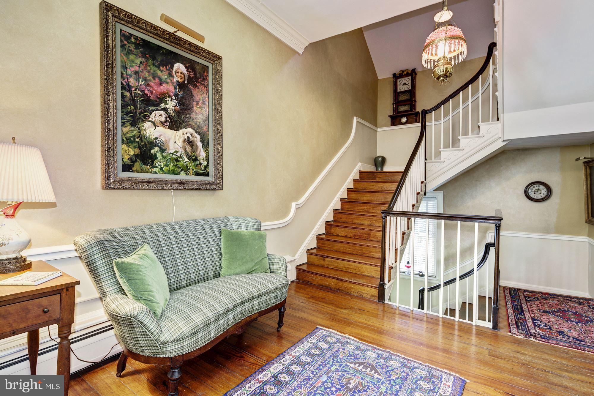 13032 Highland Road Highland, MD 20777 - Photo 30 of 114 a view of entryway livingroom and hall with wooden floor