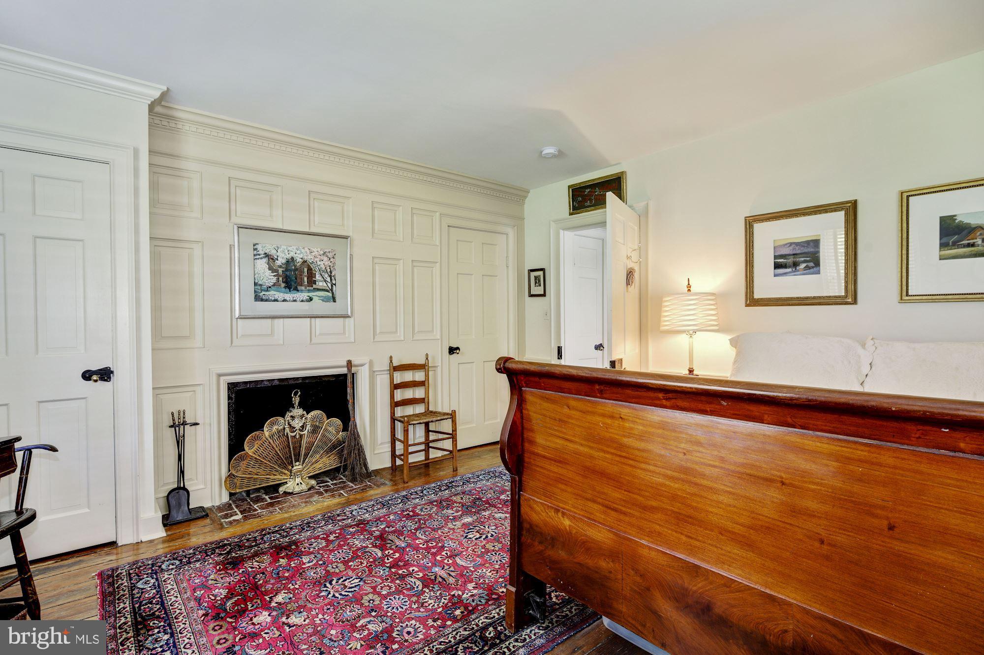 13032 Highland Road Highland, MD 20777 - Photo 40 of 114 a living room with furniture and a fireplace