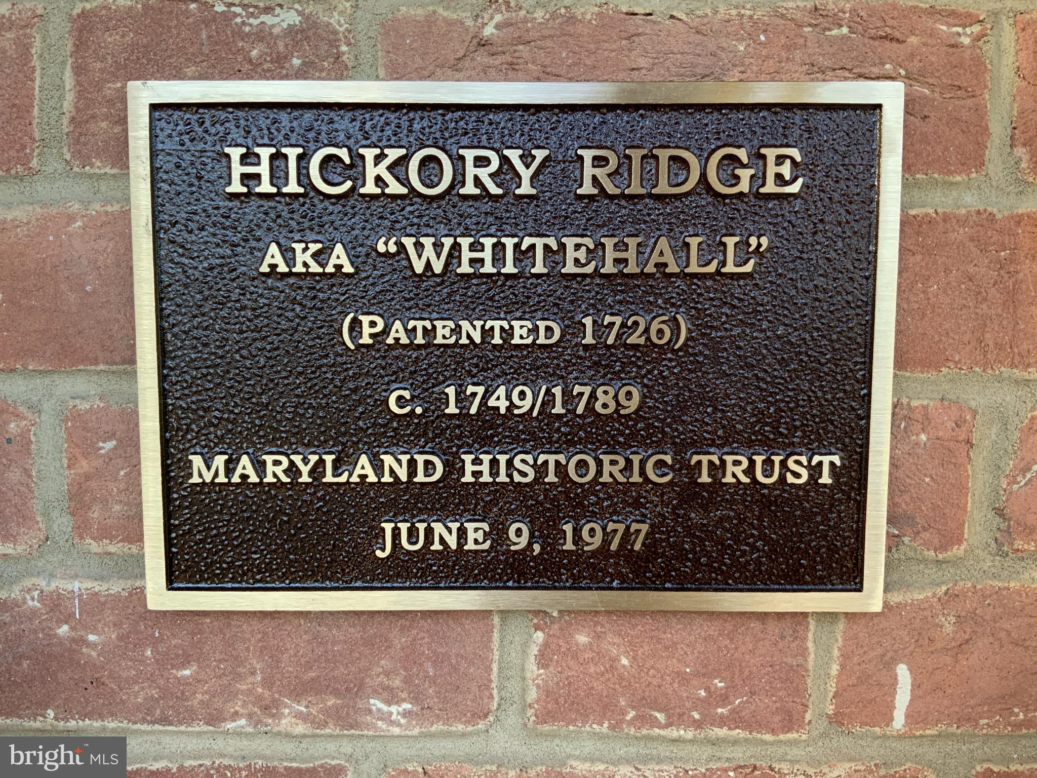 13032 Highland Road Highland, MD 20777 - Photo 5 of 114 a sign broad on the side of a building