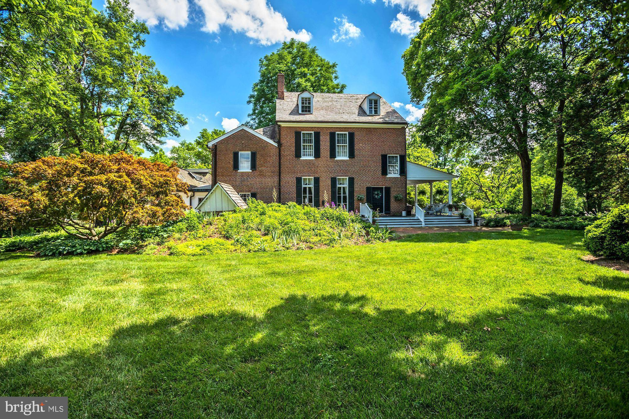 13032 Highland Road Highland, MD 20777 - Photo 56 of 114 a front view of a house with a yard