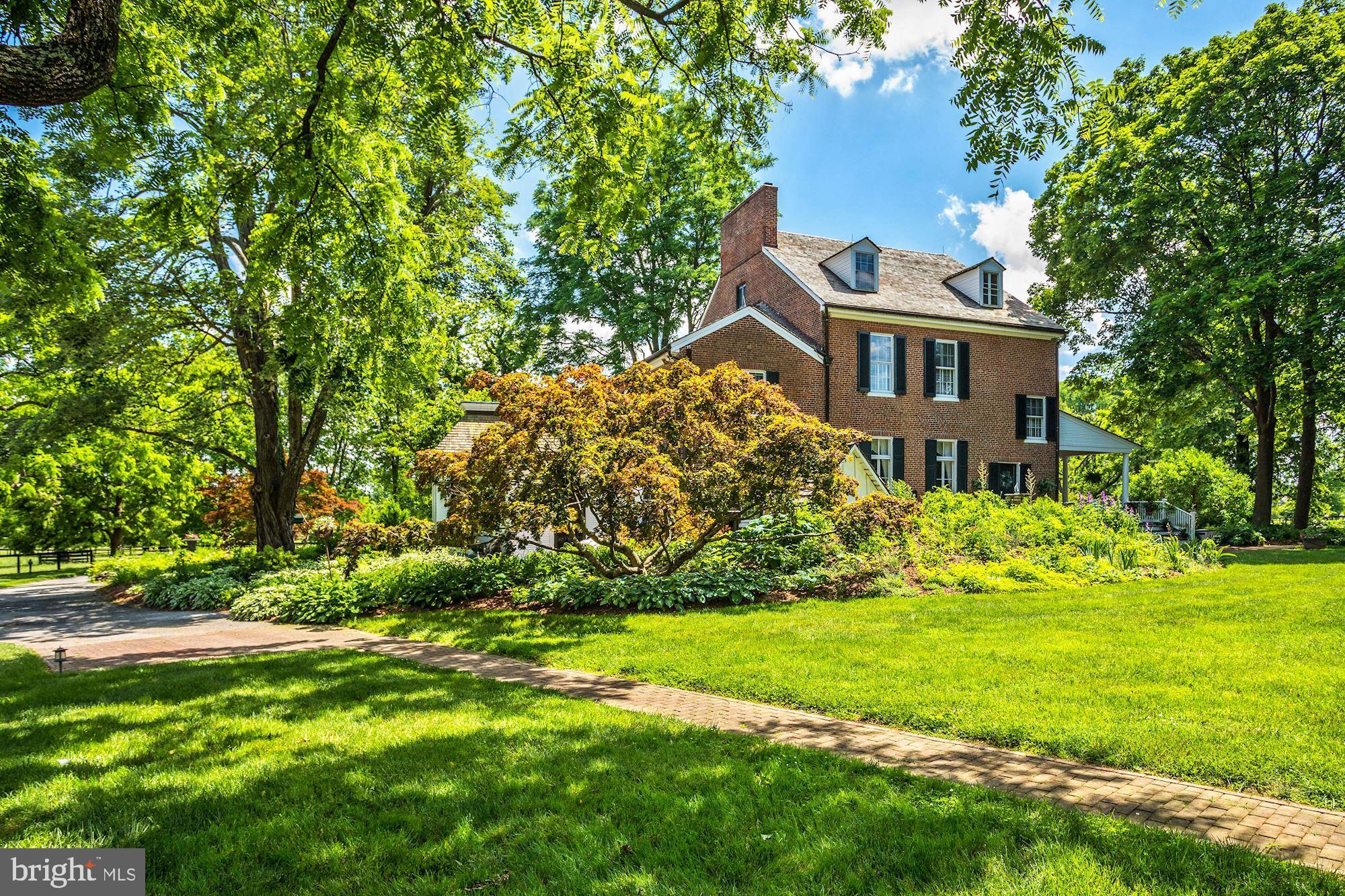 13032 Highland Road Highland, MD 20777 - Photo 57 of 114 a front view of a house with a yard