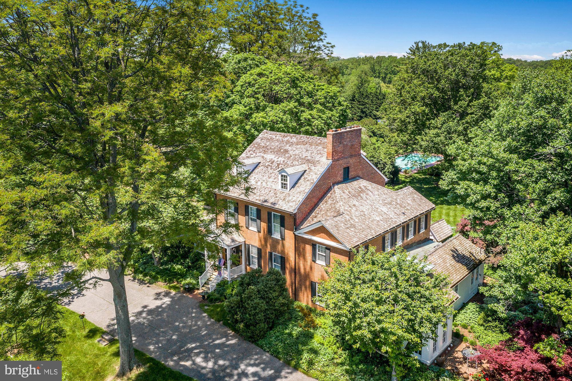 13032 Highland Road Highland, MD 20777 - Photo 7 of 114 an aerial view of a house with yard and outdoor seating