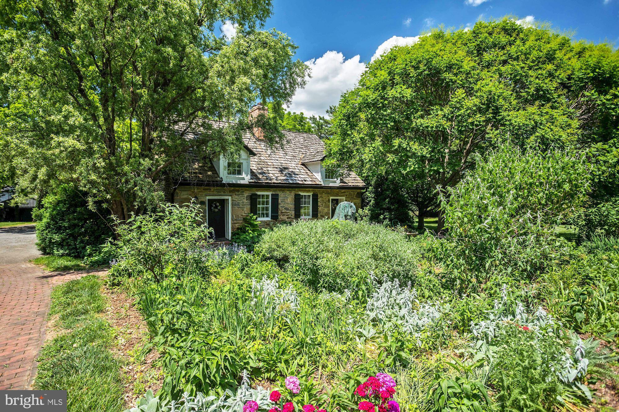 13032 Highland Road Highland, MD 20777 - Photo 79 of 114 a front view of a house with a yard