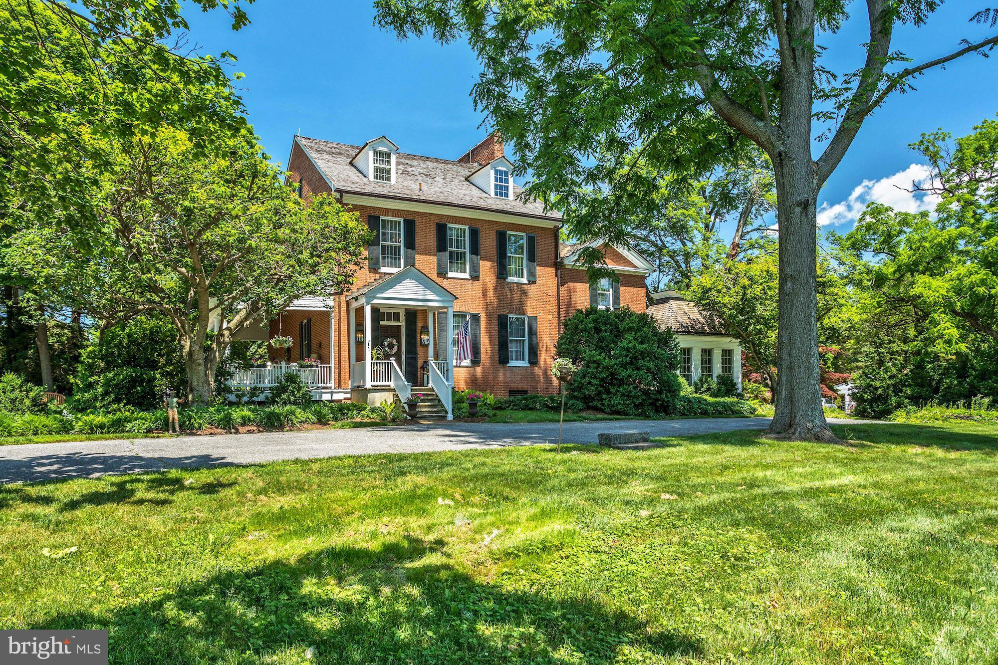 13032 Highland Road Highland, MD 20777 - Photo 8 of 114 a front view of a house with a yard