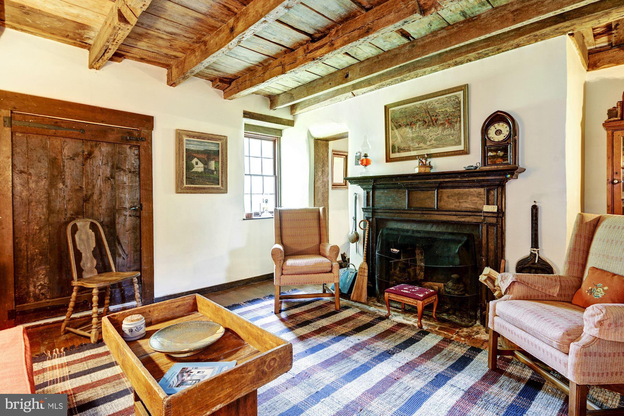 13032 Highland Road Highland, MD 20777 - Photo 81 of 114 a living room with furniture and a fireplace