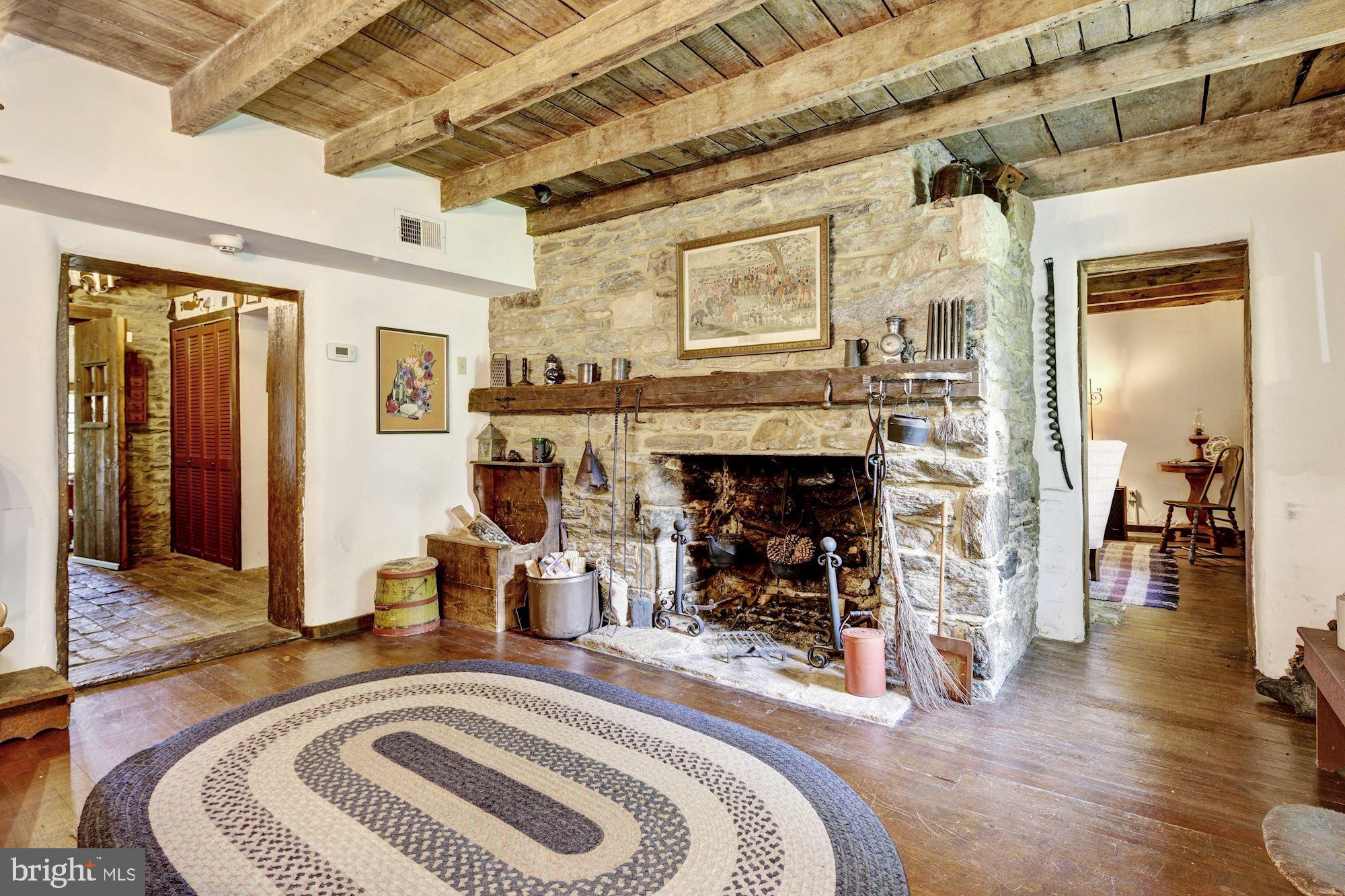 13032 Highland Road Highland, MD 20777 - Photo 82 of 114 a bedroom with furniture and a fireplace