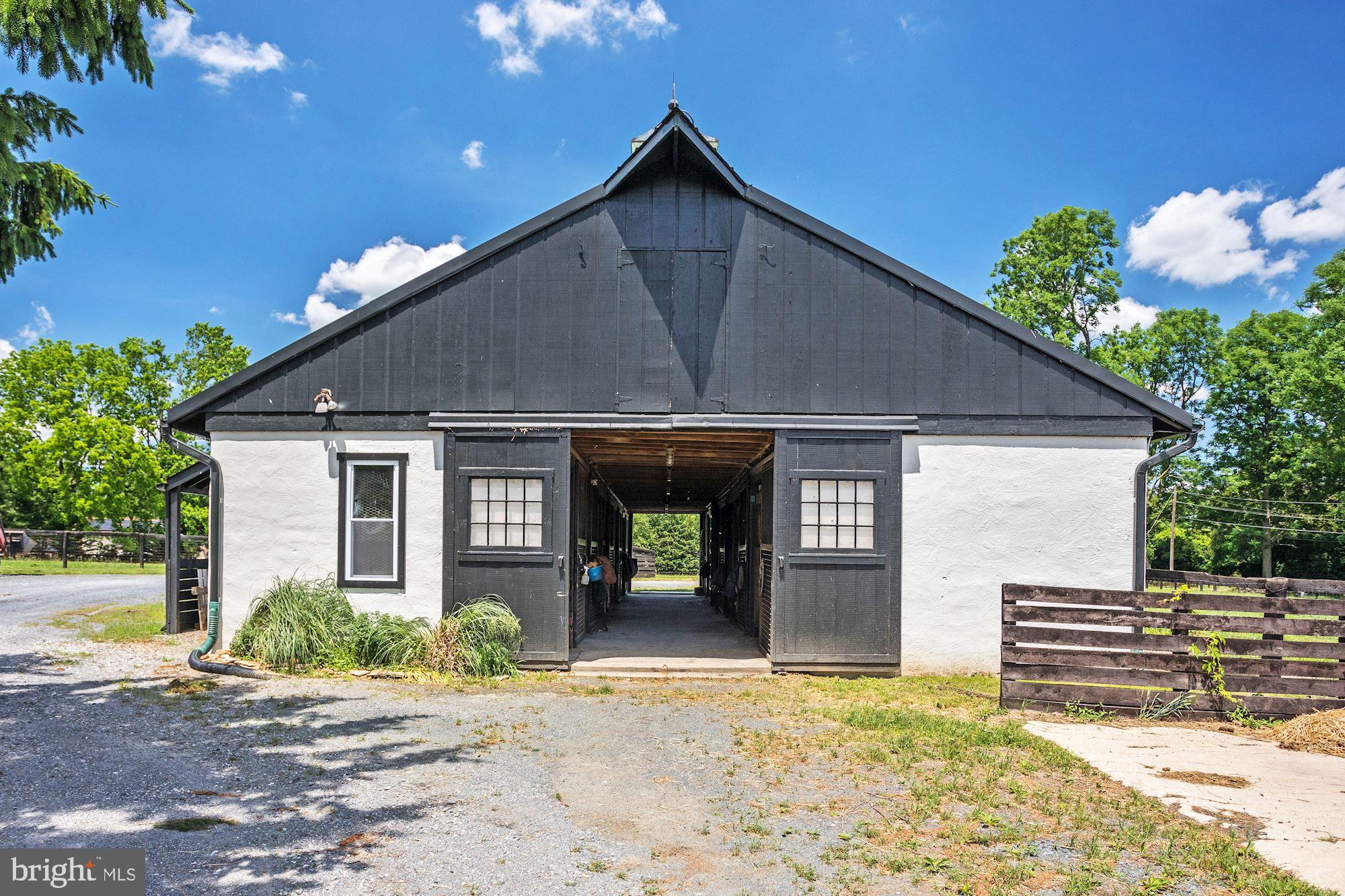 13032 Highland Road Highland, MD 20777 - Photo 100 of 114 a front view of a house with garden