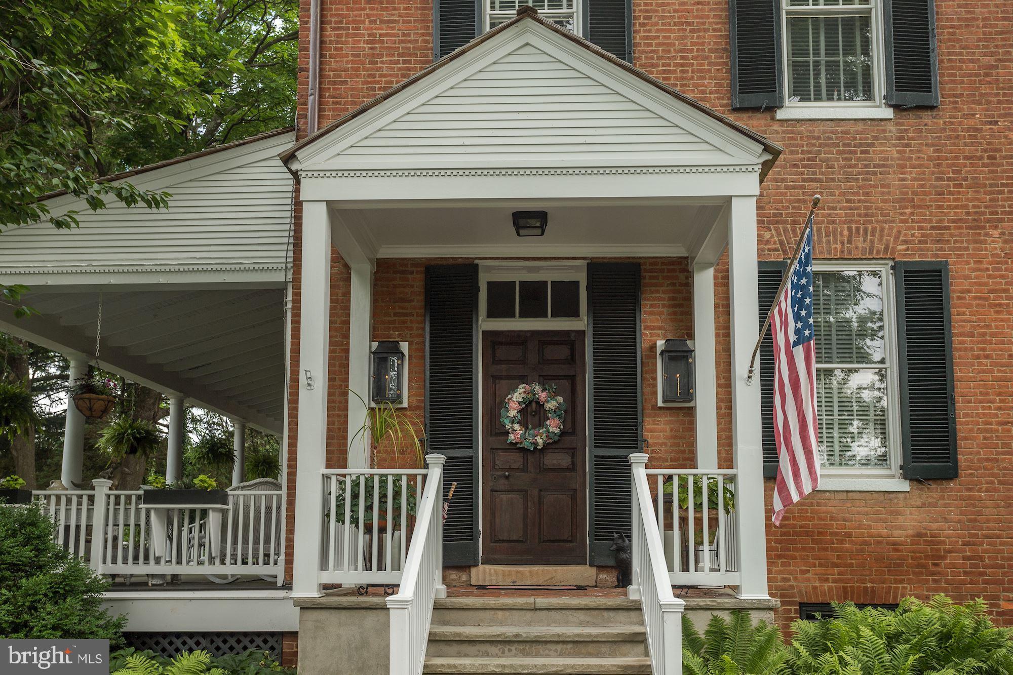 13032 Highland Road Highland, MD 20777 - Photo 10 of 114 a view of a house with a porch