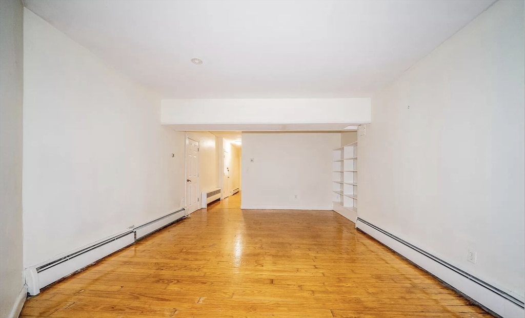 1728 Beacon Street, Unit B Brookline, MA 02445 - Photo 4 of 10 a view of an empty room