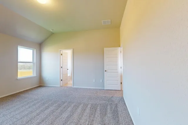 a view of an empty room and window