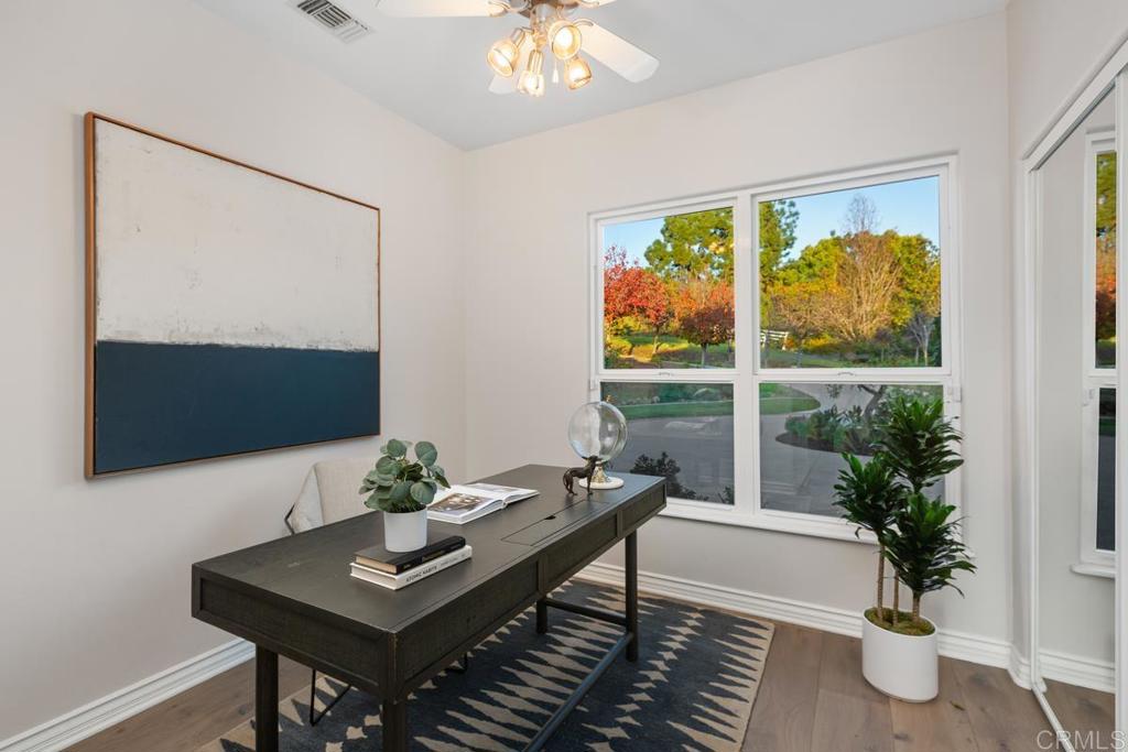 3325 Jasmine Crest Encinitas, CA 92024 - Photo 20 of 45 a living room with furniture and a potted plant