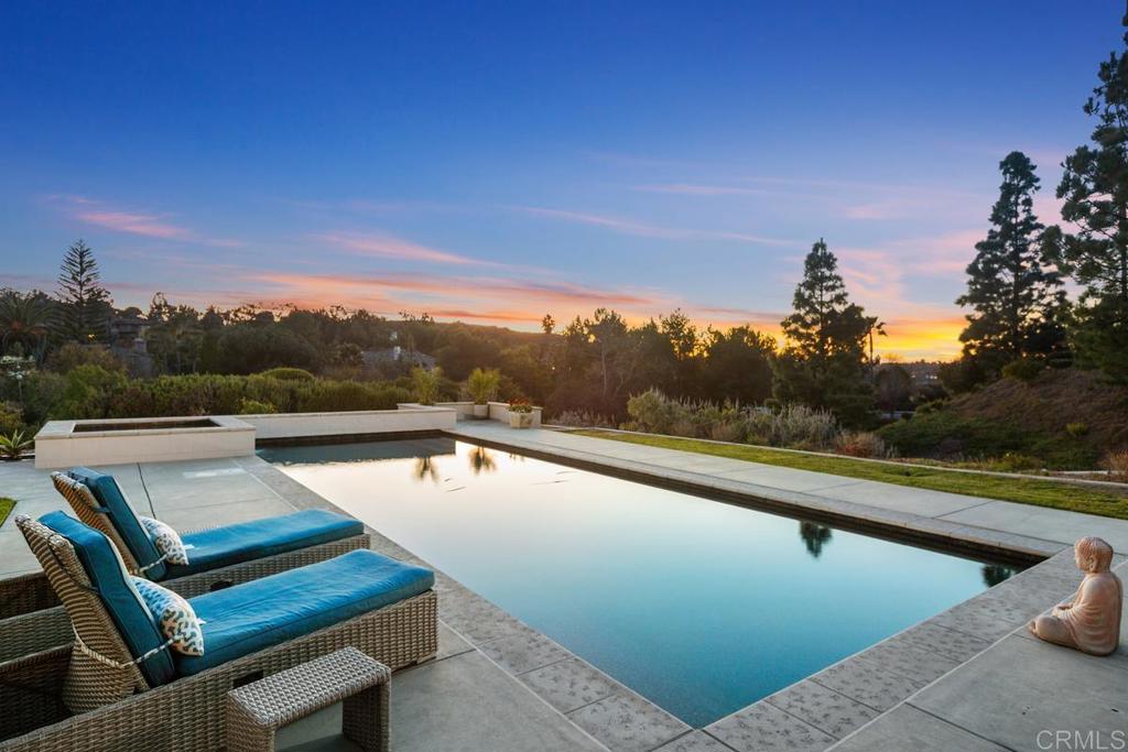 3325 Jasmine Crest Encinitas, CA 92024 - Photo 2 of 45 a view of a swimming pool with a lounge chair