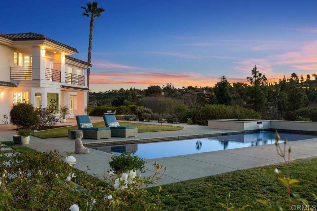 3325 Jasmine Crest Encinitas, CA 92024 - Photo 3 of 45 a view of a lake with a house in the background