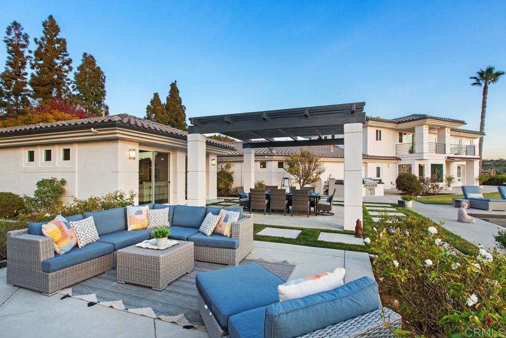 3325 Jasmine Crest Encinitas, CA 92024 - Photo 34 of 45 a view of living room filled with furniture and a floor to ceiling window