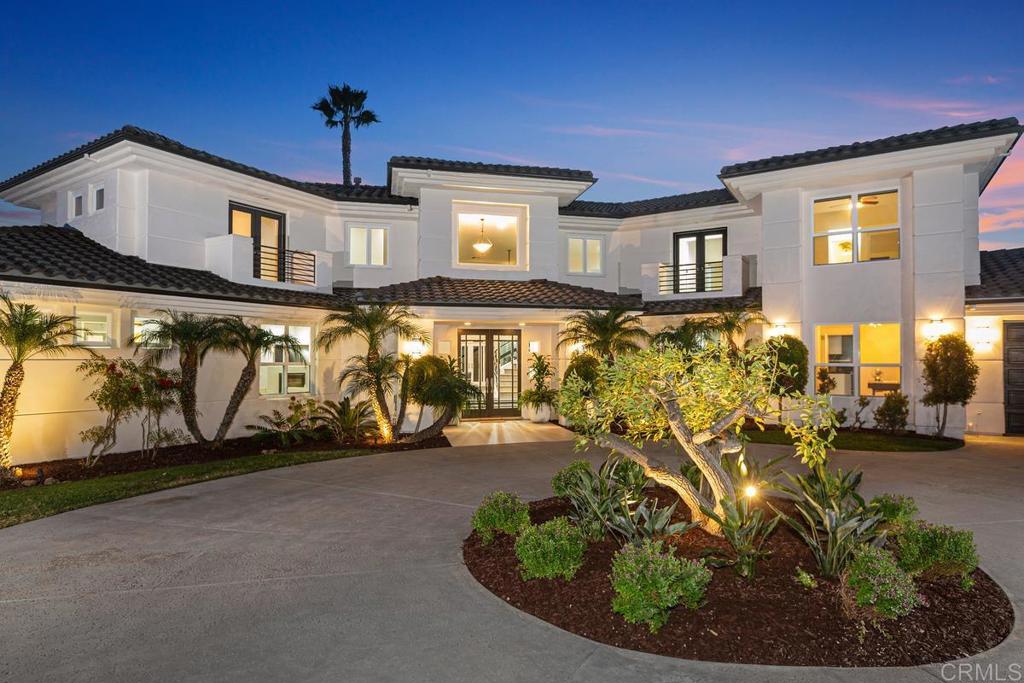 3325 Jasmine Crest Encinitas, CA 92024 - Photo 4 of 45 a view of a room with wooden floor windows and a chandelier
