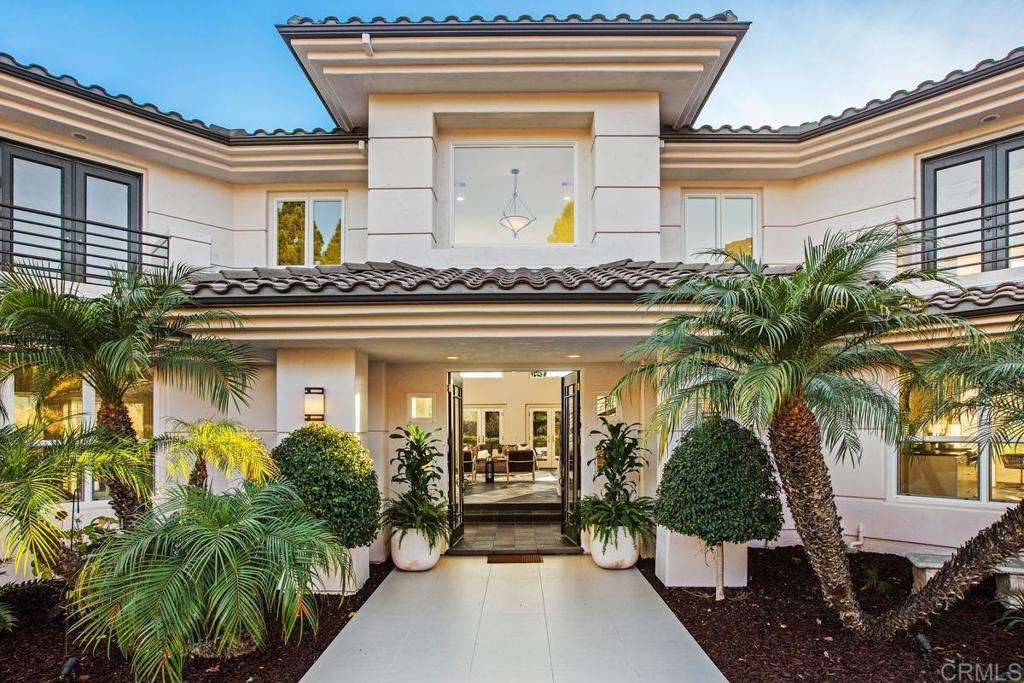 3325 Jasmine Crest Encinitas, CA 92024 - Photo 8 of 45 a view of a house with a floor to ceiling window and potted plants