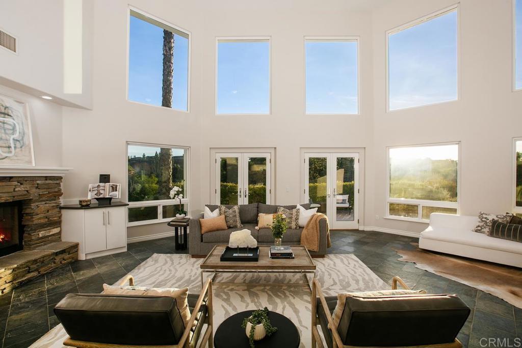 3325 Jasmine Crest Encinitas, CA 92024 - Photo 10 of 45 a living room with furniture and a fireplace