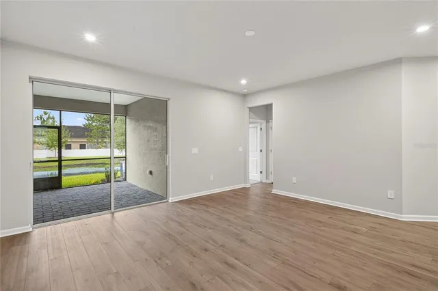 a view of a kitchen with a sink and a stove top oven