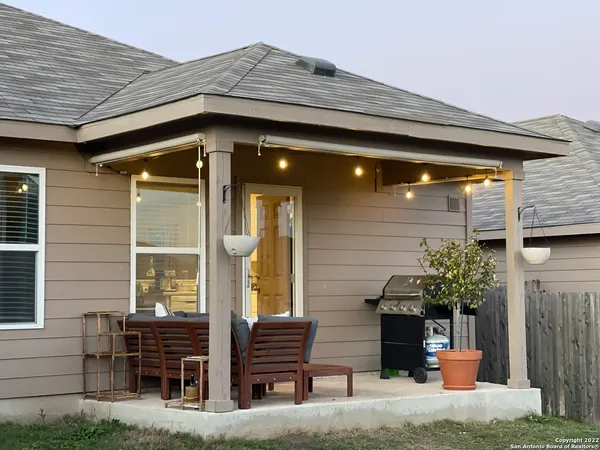 a view of house with outdoor seating space