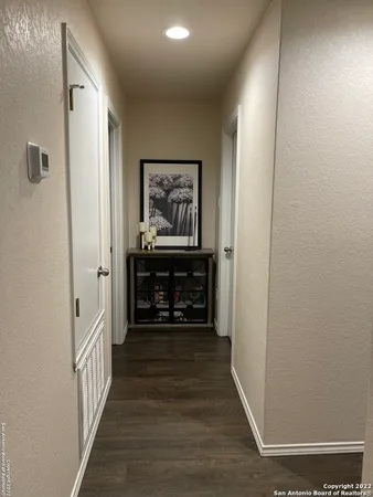 a view of a house with backyard and porch