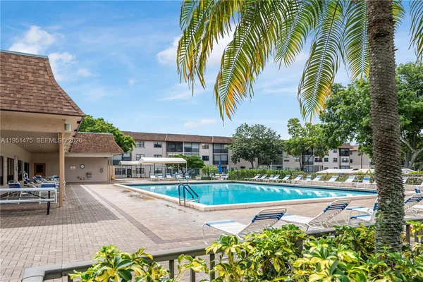 a front view of a house with swimming pool