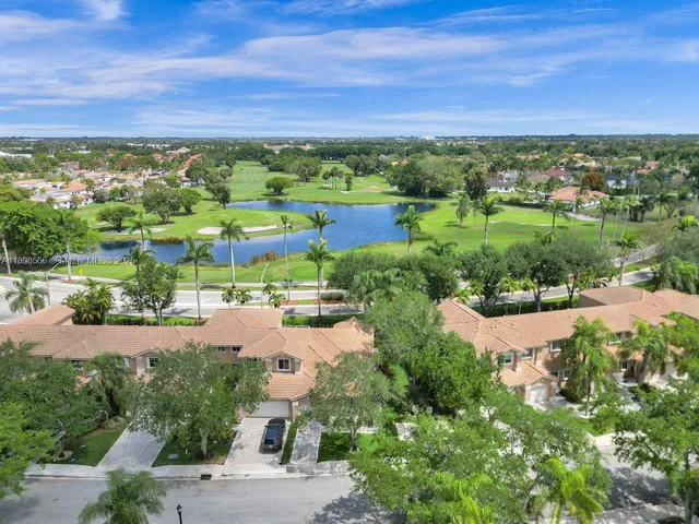 a view of a city with a lake