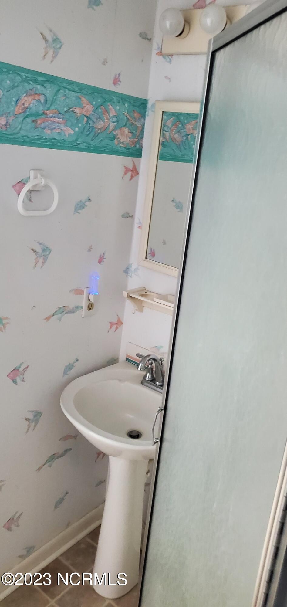 301 Commerce Way, Unit 346 Atlantic Beach, NC 28512 - Photo 31 of 36 Primary bath with new vanity