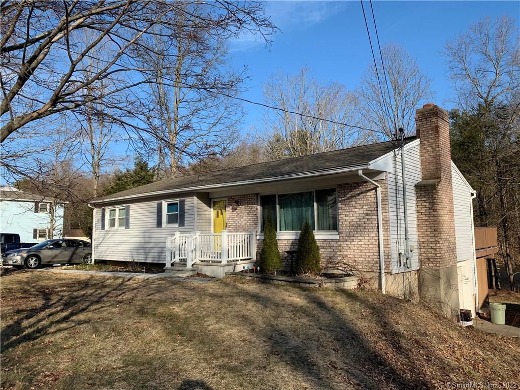 179 Union City Road Naugatuck, CT 06770 - Photo 1 of 1 a front view of a house with a yard and garage