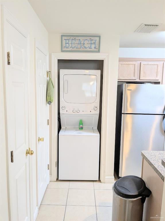 109 East Retama Street, Unit 1 South Padre Island, TX 78597 - Photo 12 of 16 a hallway with a washer and dryer