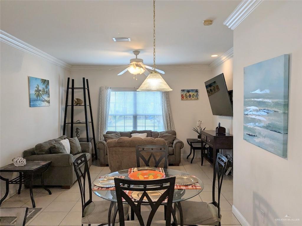 109 East Retama Street, Unit 1 South Padre Island, TX 78597 - Photo 7 of 16 a view of a livingroom with furniture and window