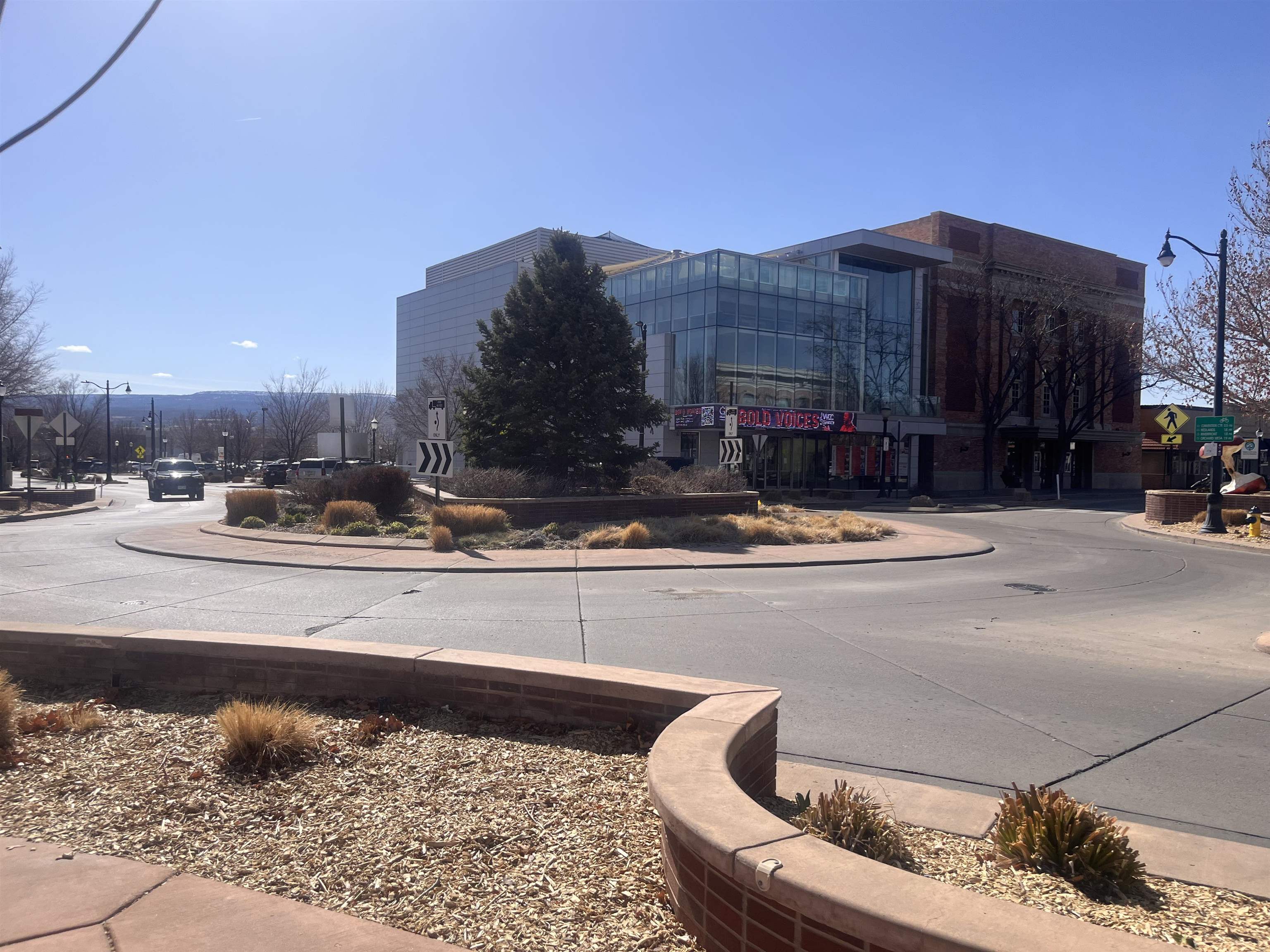 702 Main Street Grand Junction, CO 81501 - Photo 2 of 7 a view of swimming pool with a lounge chairs