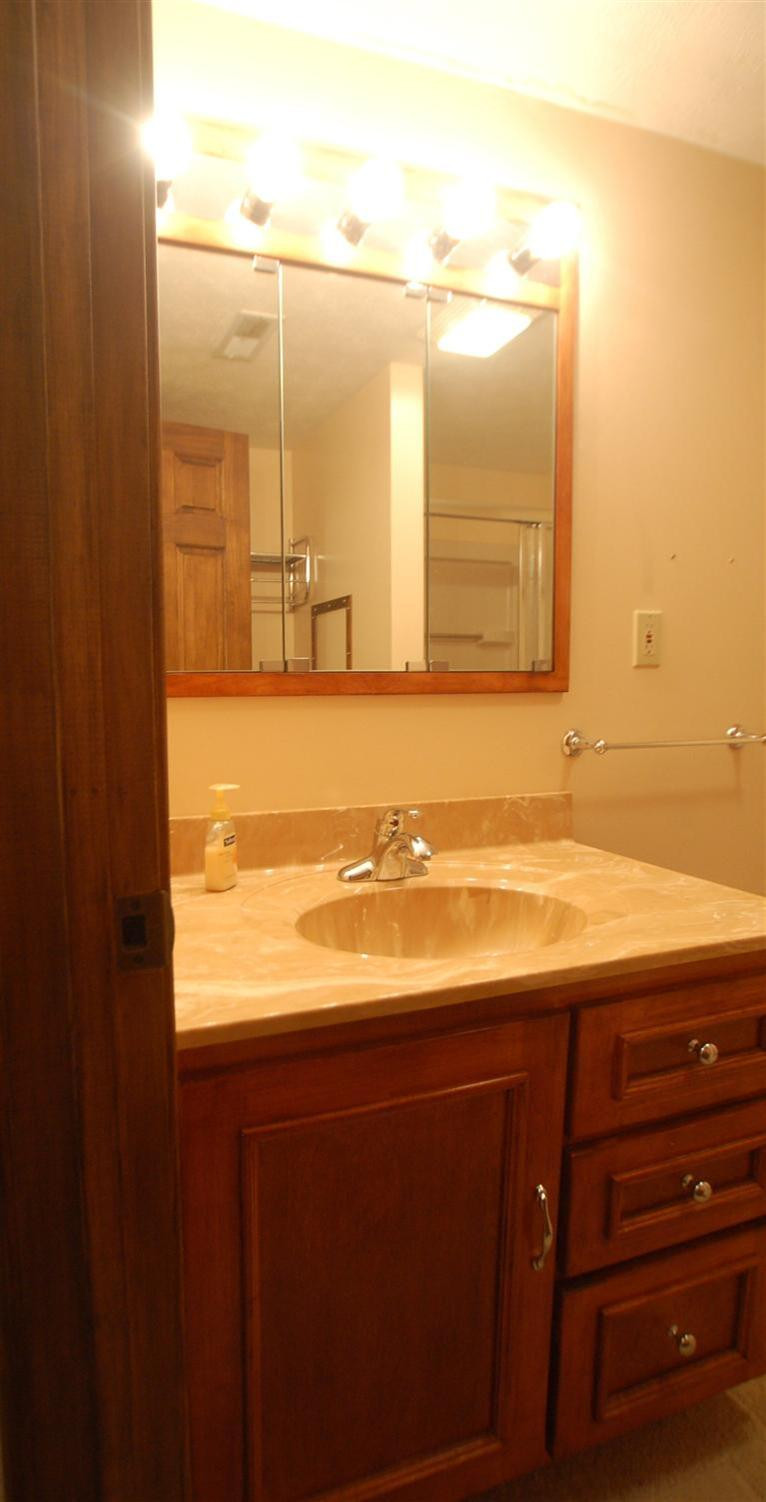 801 New Fox Road Irvine, KY 40336 - Photo 17 of 28 Large bathroom has nice cabinetry!