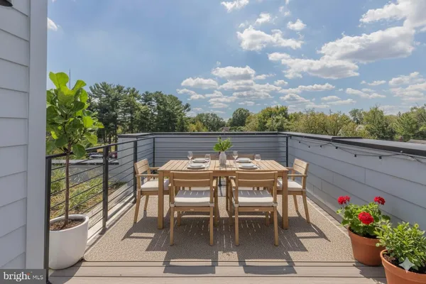 a view of balcony with furniture