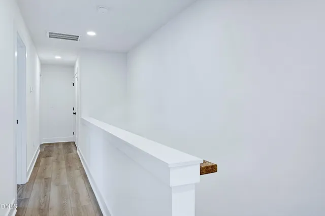 a view of hallway with stairs