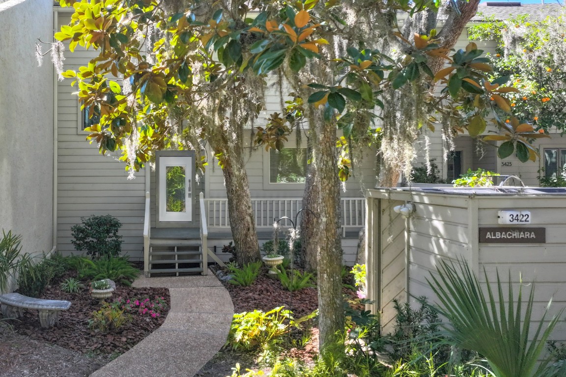 a backyard of a house with lots of green space